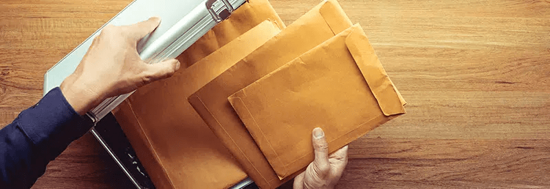envelopes in briefcase